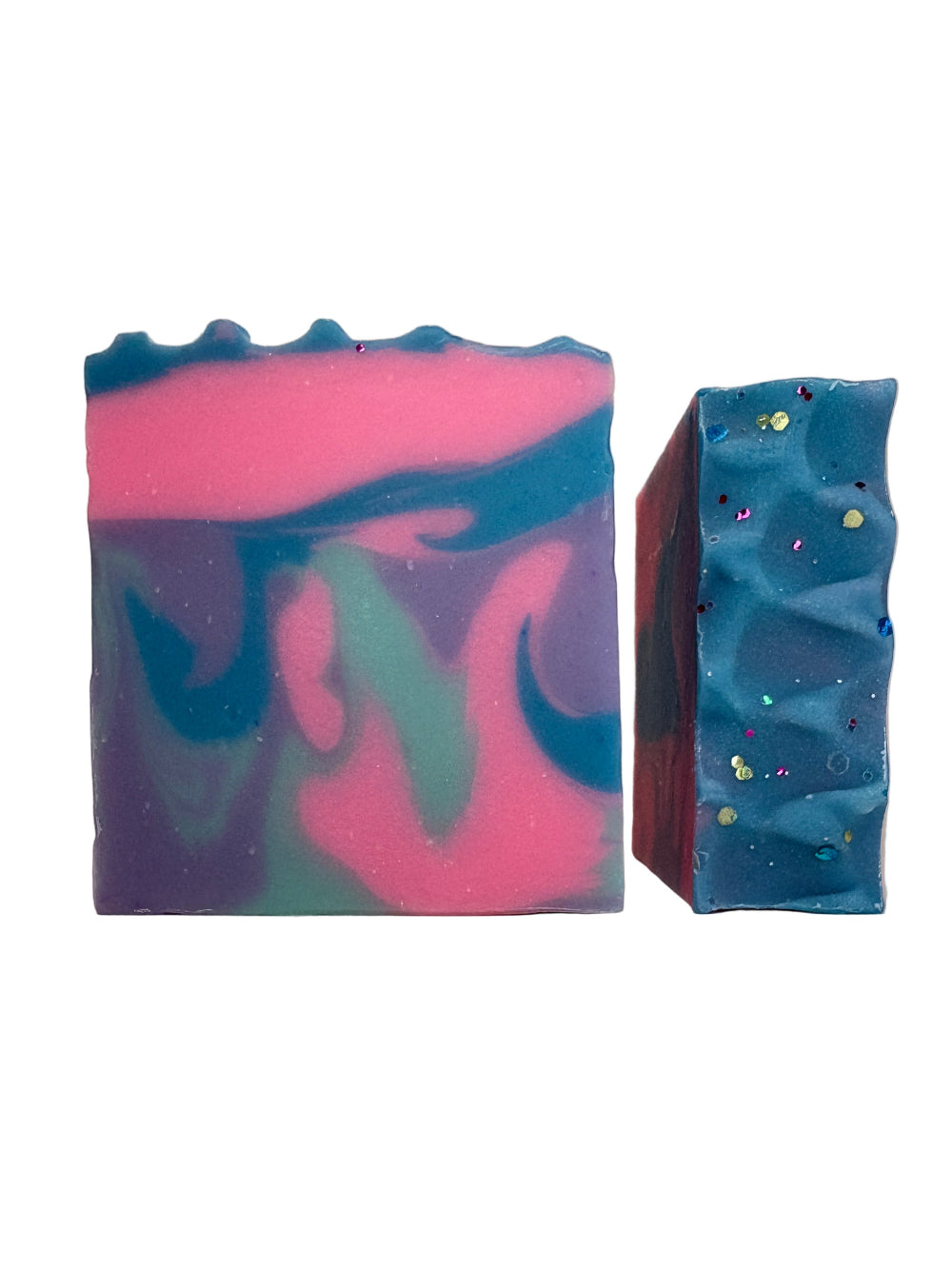 Colorful soap bars with a marbled pattern on a neutral background mermaid lagoon