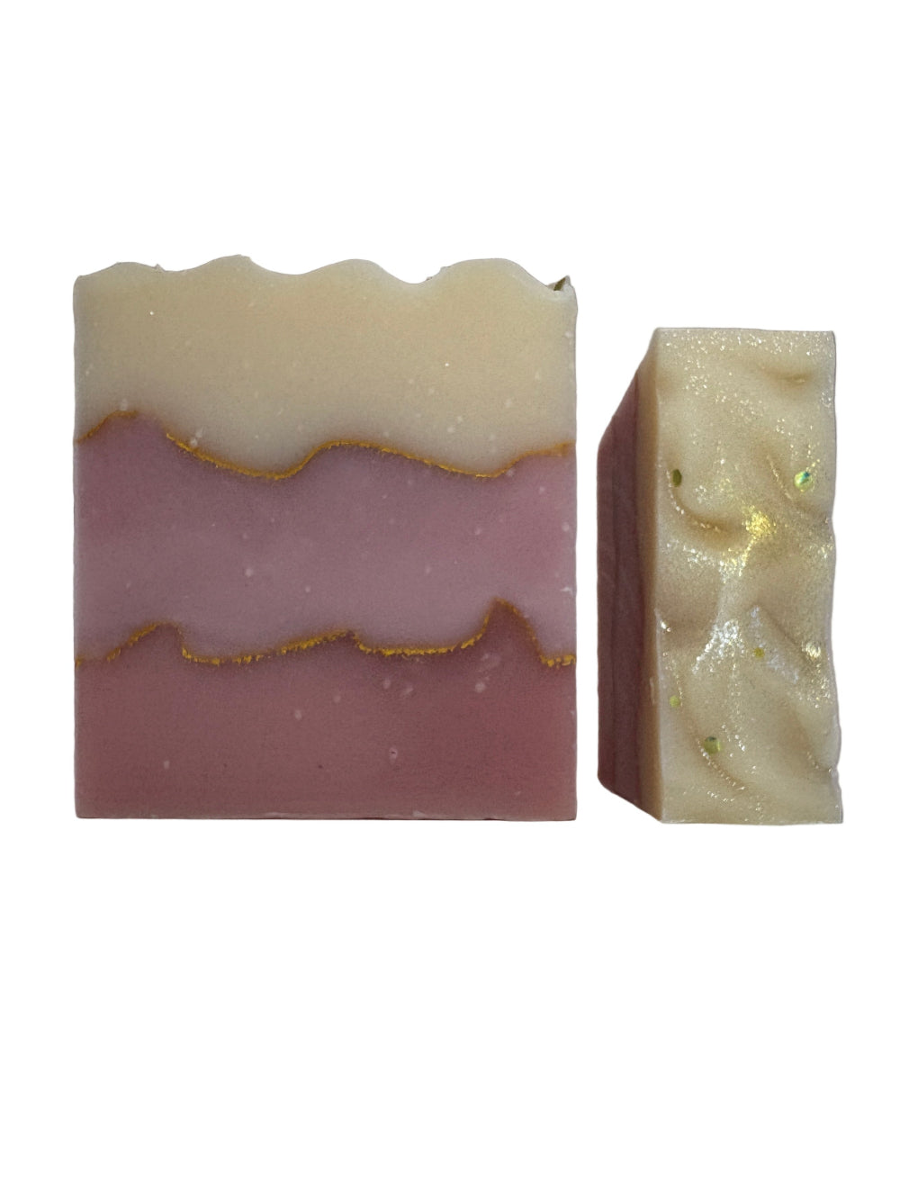 Two soap bars with a marbled design on a white background