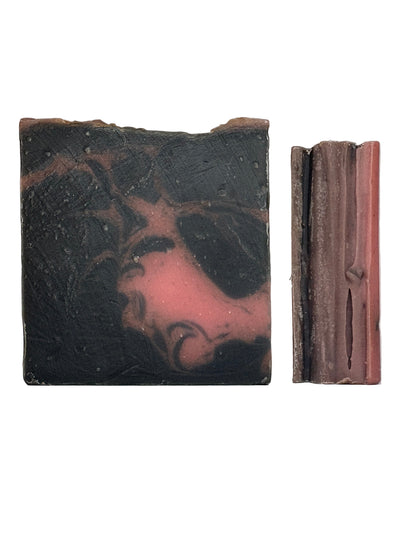 Bar soap with a black and red design on a white background
