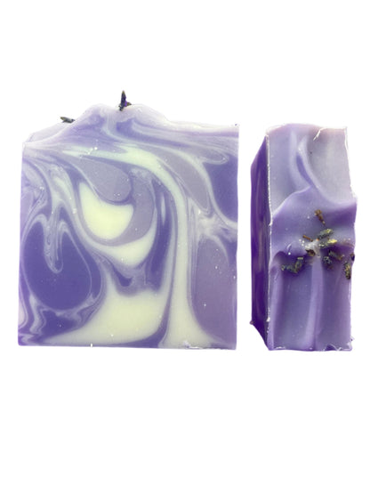 Swirl-patterned purple and white lavender soap bars on a white background